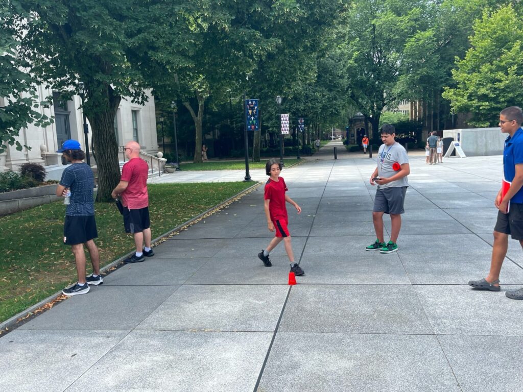 five students working together outside