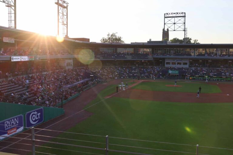 Scenic image of baseball stadium and field at sunset