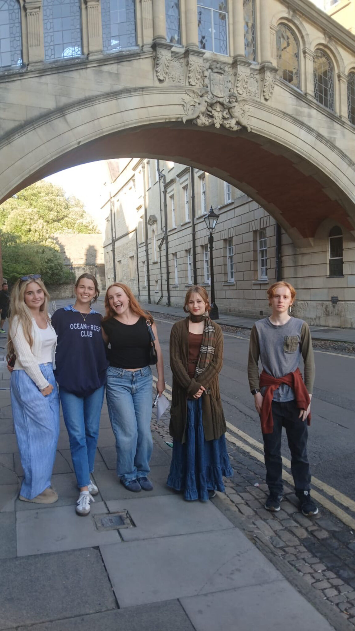 Group students stand in front of the Bridge of Sighs.