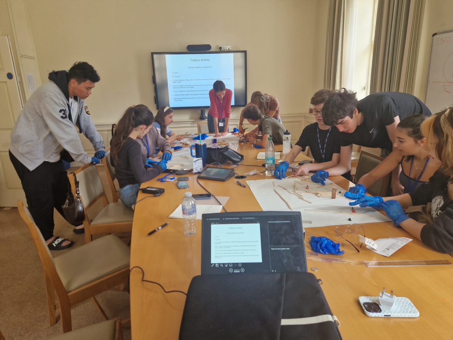 Image of students working with technology in a classroom