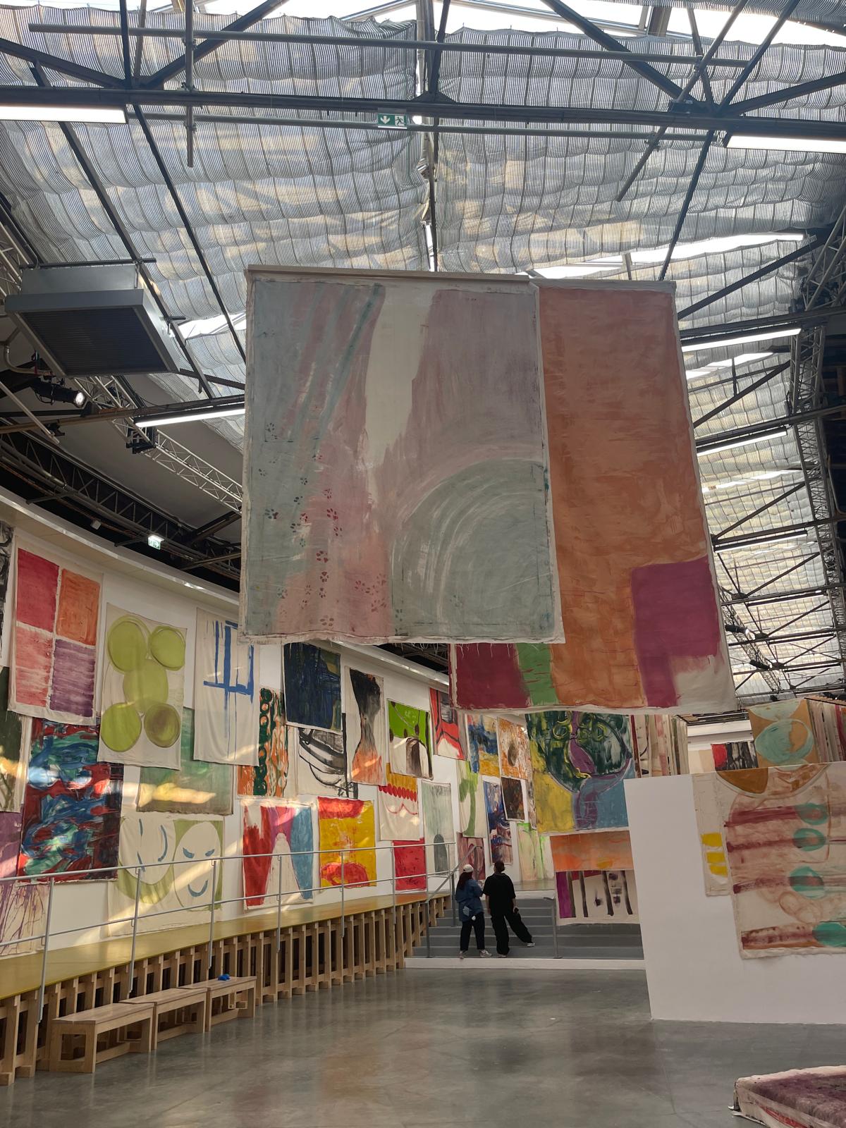 Hanging tapestry art exhibit at Palais de Tokyo