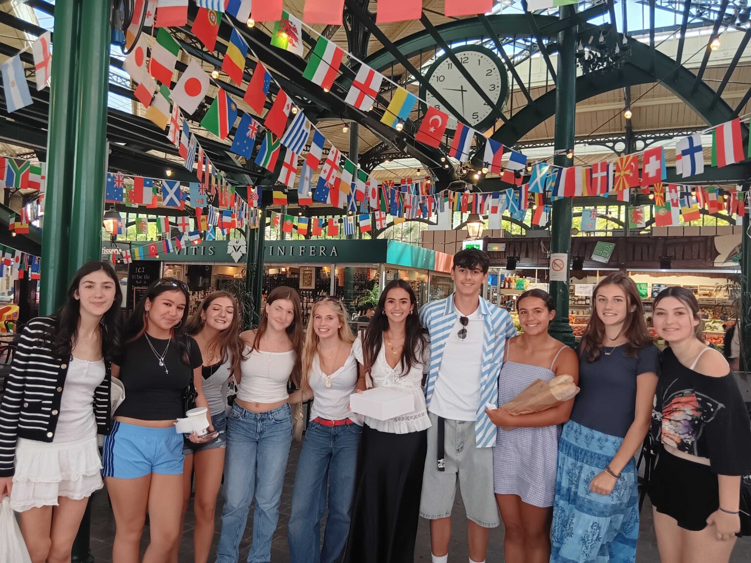 Student at french market pose for group photo
